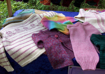 sweaters in a variety of colors and sizes